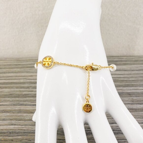 Tory Burch Crystal Logo & Imitation Pearl Station Bracelet Ivory/Tory Gold OS - Picture 13 of 16